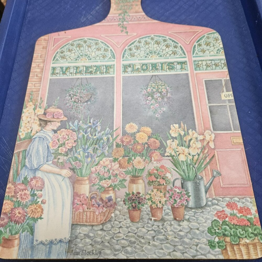 vintage wilscombe melamine cutting board featuring a florist scene
